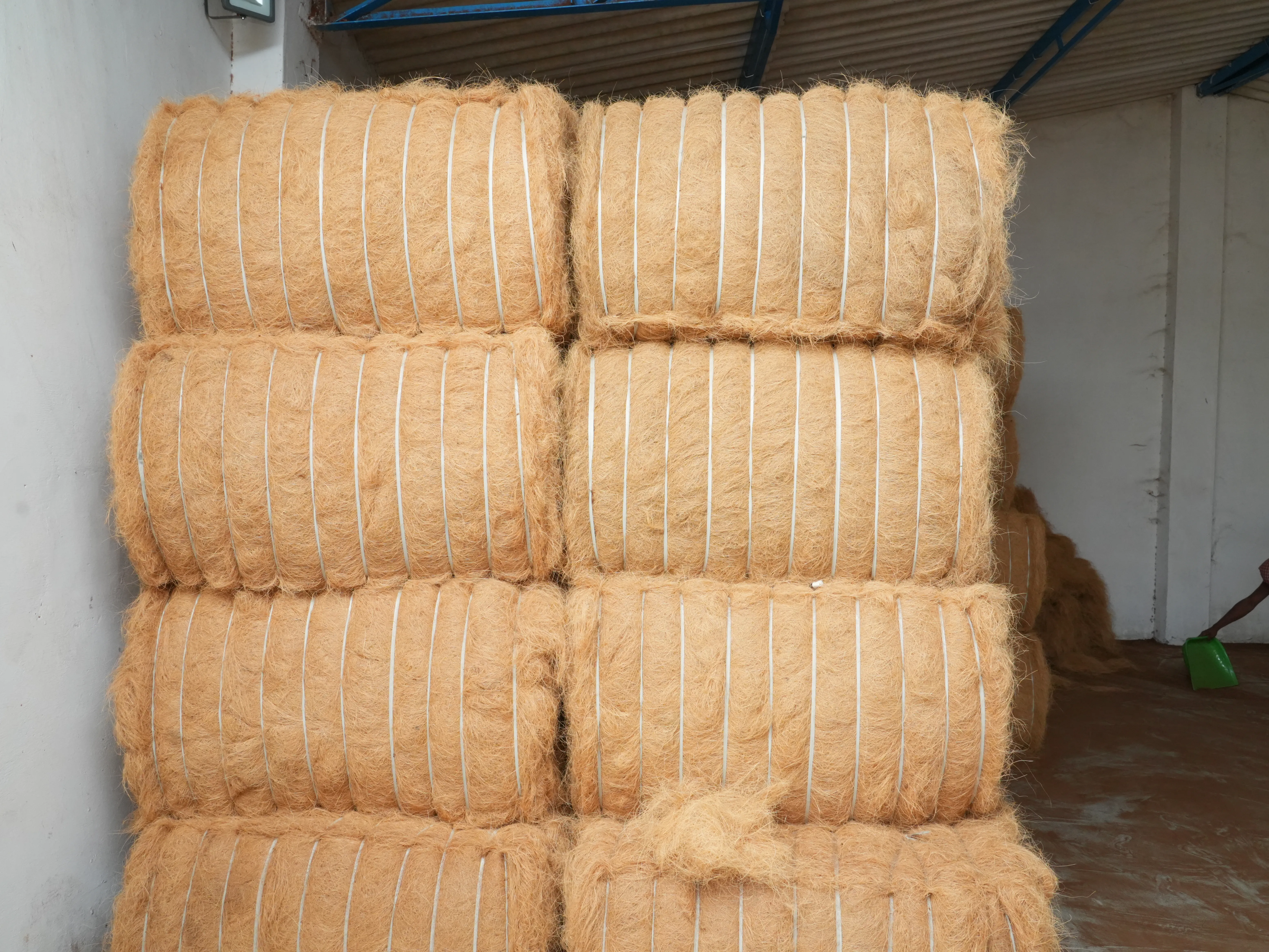 Pressed coir fibre bales in storage